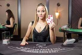 Antarmuka pemilihan meja Asia Gaming dengan filter limit dan statistik dealer